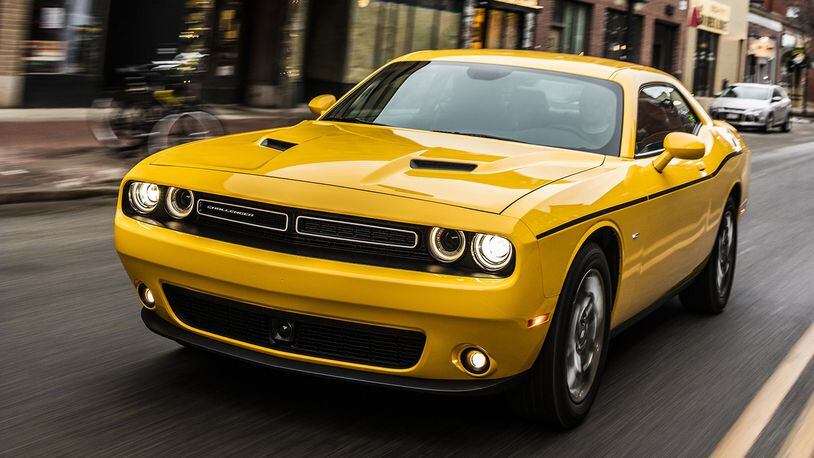 The 2018 Challenger GT is a two-door American muscle car with all-wheel drive, providing muscle car enthusiasts all-weather driving confidence exclusive to Dodge, featuring an active transfer case and front-axle disconnect. Dodge photo