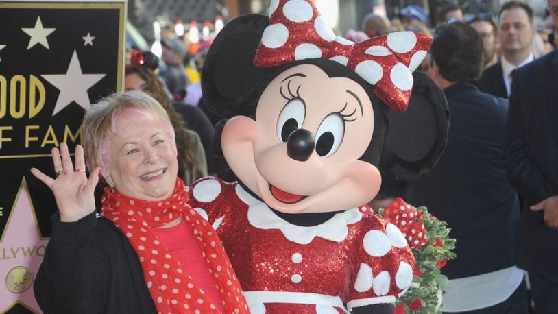 The voice of Minnie Mouse since 1986, Russi Taylor poses with Minnie during a star ceremony in celebration of the 90th anniversary of Disney's Minnie Mouse at the Hollywood Walk of Fame on January 22, 2018 in Hollywood, California.