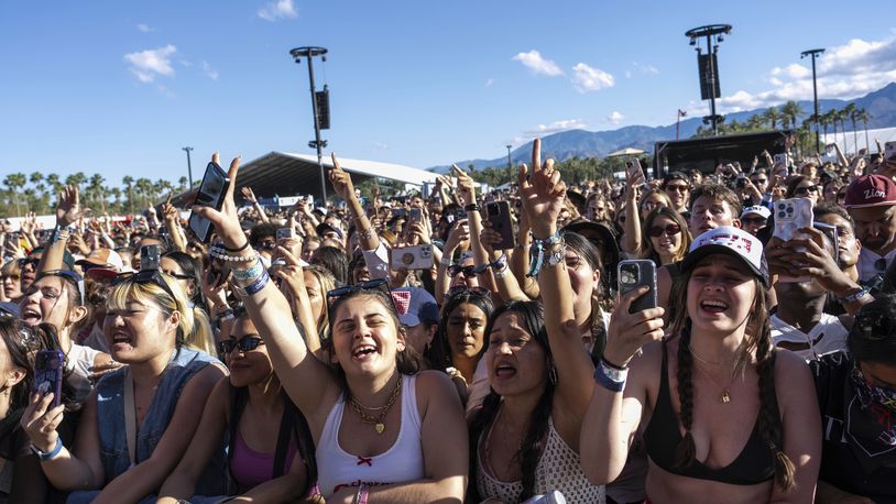 Festivalgoers attend the first weekend of the Coachella Valley Music and Arts Festival at the Empire Polo Club on Sunday, April 14, 2024, in Indio, Calif. (Photo by Amy Harris/Invision/AP)