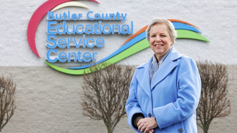 One of the jobs of Butler County Educational Service Center human resource specialist Anna Hennig is to help new substitute teachers get signed up for substitute jobs at schools in the area. NICK GRAHAM / STAFF