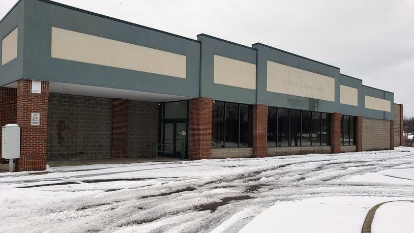 Monroe council approved legislation Tuesday for design services and a purchase agreement for the former IGA store and strip center that will be converted into a new police facility. NICK GRAHAM/STAFF