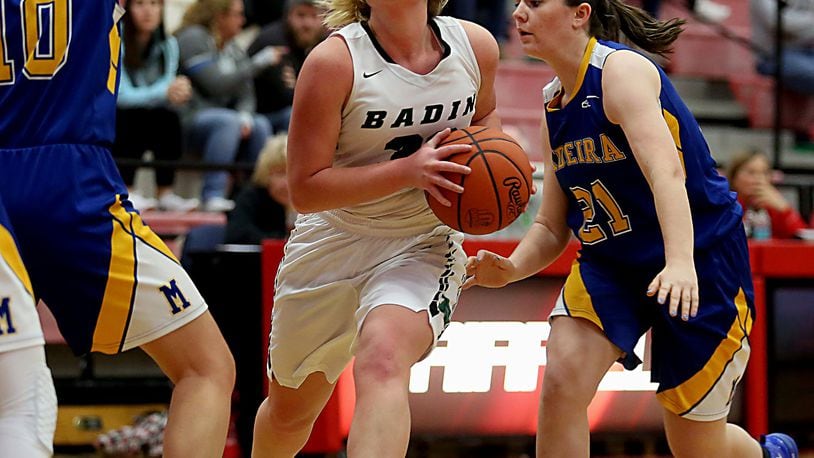 Badin forward Olivia Keene moves to the hoop between Madeira’s Molly Buzek (10) and Greta Davis (21) during their Division III sectional final Saturday afternoon at Fairfield Arena. CONTRIBUTED PHOTO BY E.L. HUBBARD