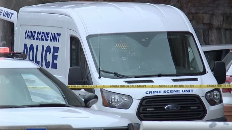 A Cincinnati police Crime Scene Unit truck sits at Yeatman's Cove, Dec. 13, 2020, after a body was found earlier that morning.