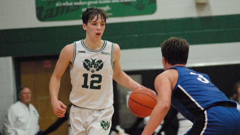 Badin's Alex Ritzie (12) is guarded by Springboro's Jaden Brown (3) night at Mulcahey Gym on Jan. 17, 2023. Chris Vogt/CONTRIBUTED
