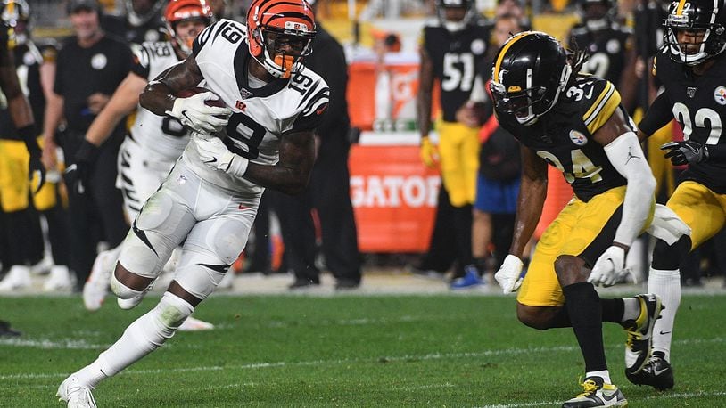 PITTSBURGH, PA - SEPTEMBER 30: Auden Tate #19 of the Cincinnati Bengals runs upfield after a catch as Terrell Edmunds #34 of the Pittsburgh Steelers defends in the second half during the game at Heinz Field on September 30, 2019 in Pittsburgh, Pennsylvania. (Photo by Justin Berl/Getty Images)