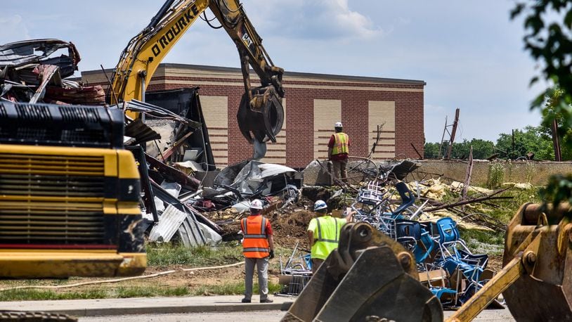 The old Carlisle High School is being demolished to make way for the new school being built behind it Tuesday, June 16, 2020. A new school building serving pre-K through 12th-grade is being built on the property and is expected to open for the 2020-2021 school year. NICK GRAHAM / STAFF