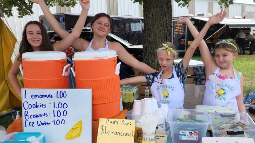 These four Butler County girls have raised money for less fortunate kids the last two years by selling lemonade. They raised more than $4,000 last year and the goal this year is $5,000. From left, Terre Merrill, Emma Merrill, Myaha Paynter and Aria Merrill. CONTRIBUTED