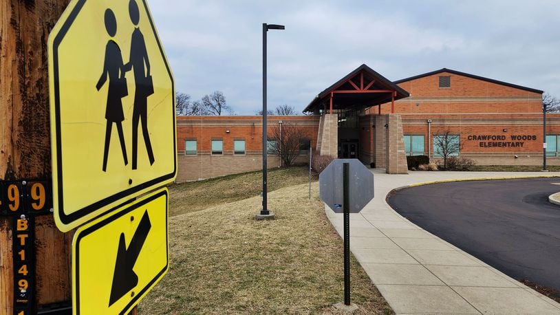 The city on Hamilton will seek a grant from ODOT's Safe Routes to School Grant Program for infilling sidewalks and installing ADA compliant curb ramps, crosswalks, and signage around Crawford Woods Elementary School. NICK GRAHAM/STAFF