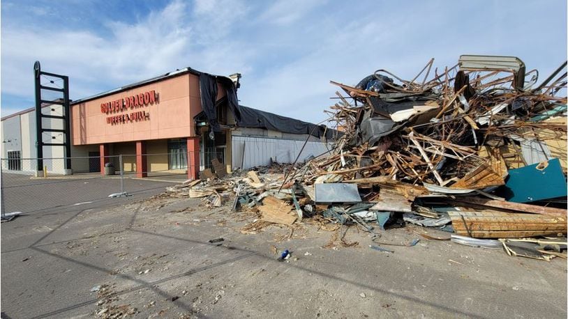 Demolition is happening at the Hamilton West Shopping Center. The Golden Dragon Buffet & Grill will remain. NICK GRAHAM/STAFF