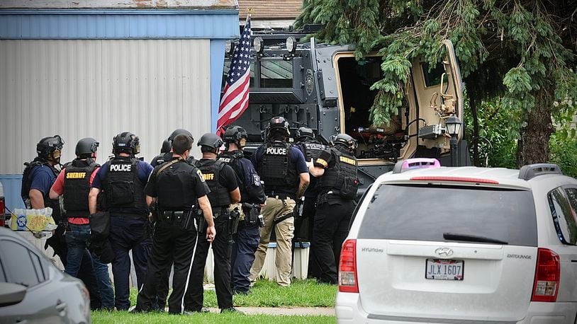 SWAT officers respond to Harmony Estates in Harmony Township. MARSHALL GORBY/STAFF