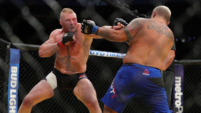 LAS VEGAS, NV - JULY 9: Brock Lesnar punches Mark Hunt (R) during the UFC 200 event at T-Mobile Arena on July 9, 2016 in Las Vegas, Nevada. (Photo by Rey Del Rio/Getty Images)