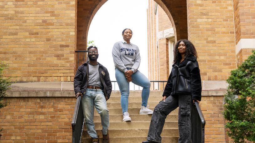 Awa Nyambi, 25, left, Alyssa Whitaker, 25, and Kenadi Mitchell, 24, law students at Howard University School of Law, pose for a portrait, Friday, April 19, 2024, in Washington. The students are part of a group of young Black lawyers working to protect voting rights during the 2024 election. (AP Photo/Jacquelyn Martin)