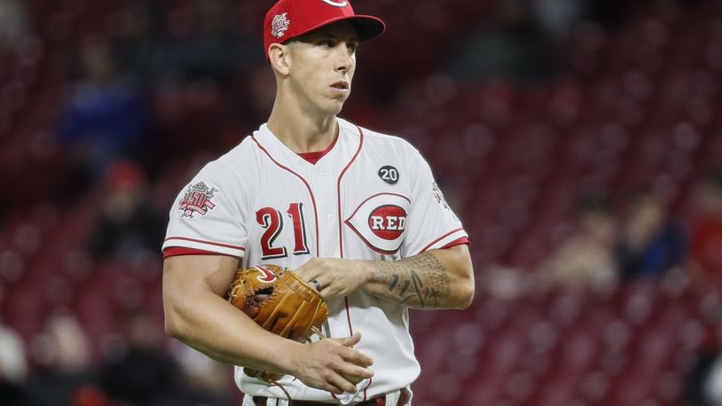 Cincinnati Reds relief pitcher Michael Lorenzen in the sixth inning of a baseball game after giving up a three-run home run to Milwaukee Brewers’ Orlando Arcia, Tuesday, April 2, 2019, in Cincinnati. (AP Photo/John Minchillo)