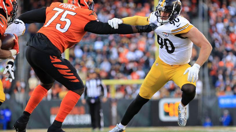 Pittsburgh Steelers outside linebacker T.J. Watt (90) battles Cincinnati Bengals offensive tackle Isaiah Prince (75) as he tries to rush the passer during the second half of an NFL football game, Sunday, Nov. 28, 2021, in Cincinnati. (AP Photo/Aaron Doster)