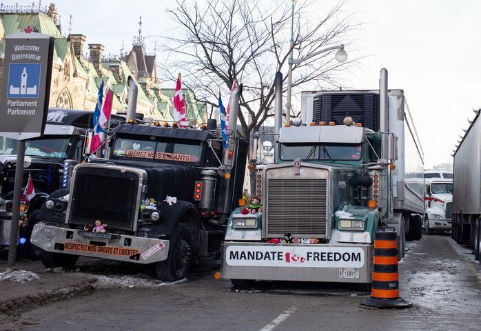Heavy trucks parked outside of Parliament in Ottawa, Ontario, on Monday morning, Feb. 76, 2022, in Canada.(Ian Austen/The New York Times)