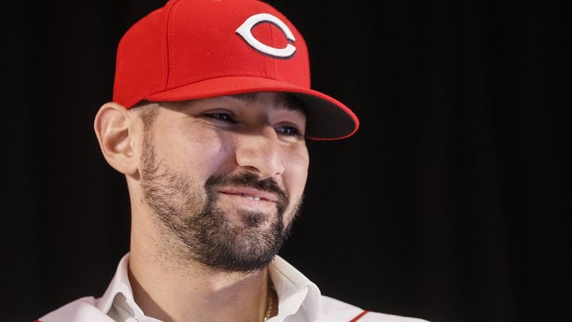 Cincinnati Reds’ Nick Castellanos wears his cap during a news conference, Tuesday, Jan. 28, 2020, in Cincinnati. Castellanos signed a $64 million, four-year deal with the baseball club. (AP Photo/John Minchillo)