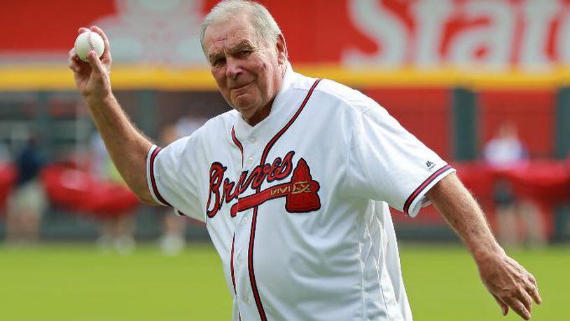 Former Atlanta Braves manager Bobby Cox throws out the first pitch before the start of their game against the Los Angeles Dodgers in Game 4 of a National League Division Series baseball game Monday, Oct. 8, 2018, in Atlanta.