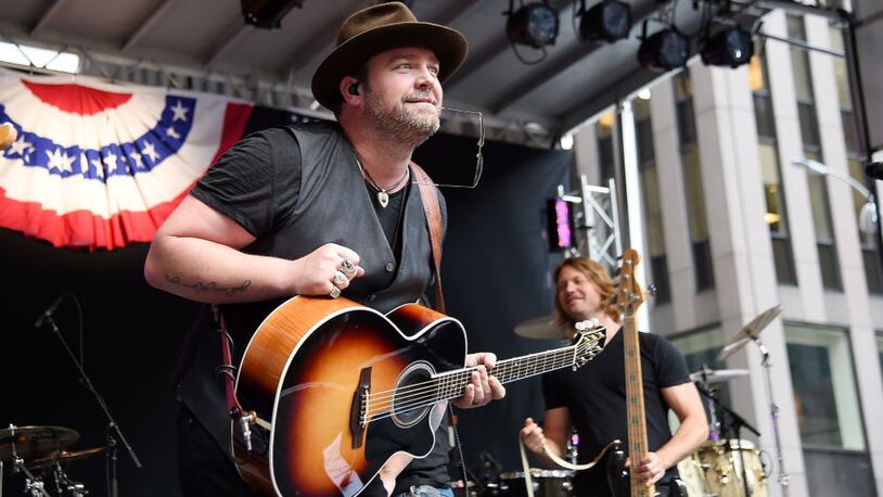 Rodney Parker and Liberty Beach, a country band from Sylvania, Ohio, was booted from an opening slot for Nashville star Lee Brice after complaints over a Facebook post. In this photo, American singer-songwriter Lee Brice performs On Fox & Friends' All-American Summer Concert Series at FOX Studios on June 30, 2017 in New York City.  (Photo by Nicholas Hunt/Getty Images)