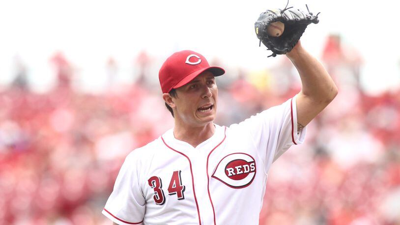 Reds starter Homer Bailey reacts after giving up a home run in the first inning against the Nationals on Sunday, July 16, 2017, at Great American Ball Park in Cincinnati. David Jablonski/Staff
