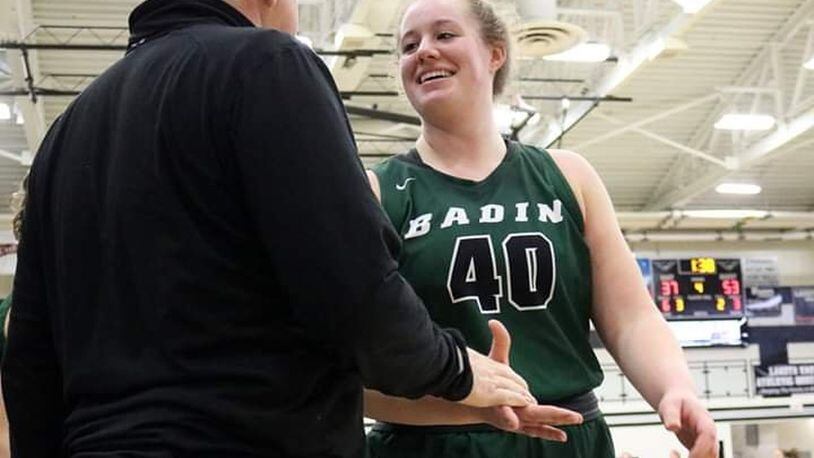 Badin senior forward Emma Broermann is congratulated after coming off the floor toward the end of the Rams’ 53-38 victory at Lakota East on Thursday night. She scored her 1,000th career point in the second quarter. CONTRIBUTED PHOTO BY TERRI ADAMS