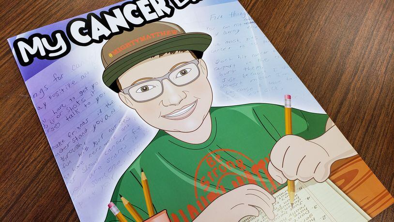 Sarah Curry Rathel and illustrator Bob Kelly, with Smile Books Project, created the book, “My Cancer Life,” to tell the story of Matthew Harrison, a sixth-grader at Chamberlain Middle School in Carlisle and his life dealing with Leukemia. NICK GRAHAM/STAFF
