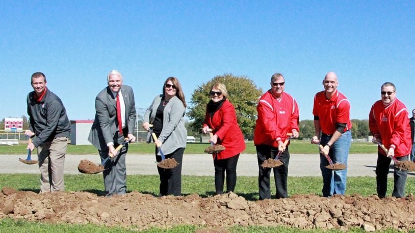 Members of the Carlisle Board of Education were on hand to turn some dirt Tuesday, Oct. 23, 2018, during the ground breaking ceremony. From left are: Treasurer Dan Bassler, Superintendent Larry Hook, Board Members Mollie McIntosh,Tammy Lainhart, Bill Jewell, Dale More and Bryan Dunkman. The new $49 million school building that will house students in grades pre-school, through grade 12 as well as the school district offices. The building is expected to open in the fall of 2020. CONTRIBUTED