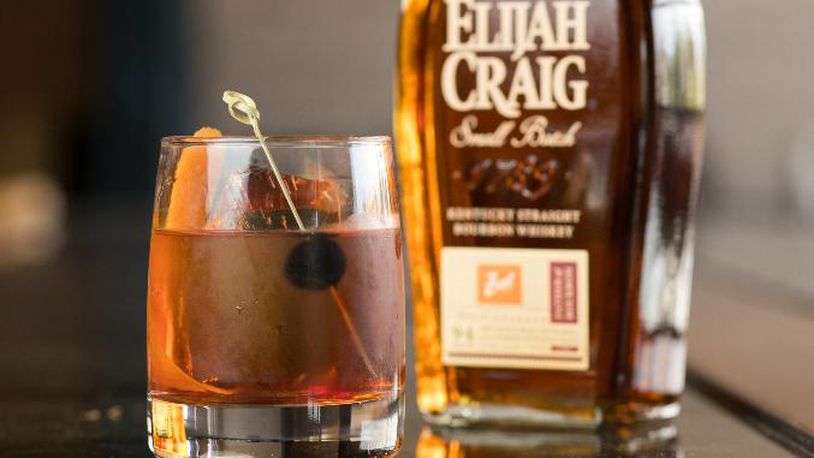 July 19, 2018 - Marietta, Ga: Zeal restaurant's signature drink the Zeal Old Fashion is shown with a bottle of Elijah Craig's small batch kentucky straight bourbon whiskey Thursday, July 19, 2018, in Marietta, Ga. This is part of a Q&A on Zeal restaurant owner and chef Scott Sawant about his upcoming participation in the Taste of Atlanta in October. This is scheduled to run in the 2018 September issue of Living Northside. (JASON GETZ/SPECIAL TO THE AJC)