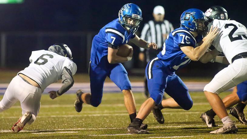 Brookville High School junior Tim Davis runs the ball during their game against Franklin on Thursday night in Brookville. Davis rushed for two touchdowns as the Blue Devils won 21-7. CONTRIBUTED PHOTO BY MICHAEL COOPER