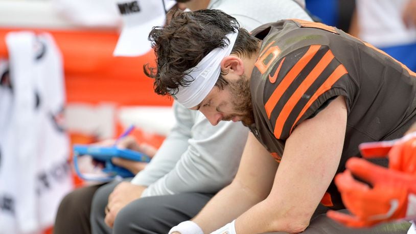 CLEVELAND, OHIO - SEPTEMBER 08: Quarterback Baker Mayfield #6 of the Cleveland Browns hangs his head while on the bench during the second half against the Tennessee Titans at FirstEnergy Stadium on September 08, 2019 in Cleveland, Ohio. The Titans defeated the Browns 43-13. (Photo by Jason Miller/Getty Images)