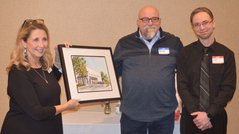 Gaslight Brewhouse was one of the Oxford Chamber of Commerce’s Businesses of the Year. Accepting the award from Chamber President Kelli Riggs, left, were Dave Hornak and Jessie Sams. CONTRIBUTED/BOB RATTERMAN