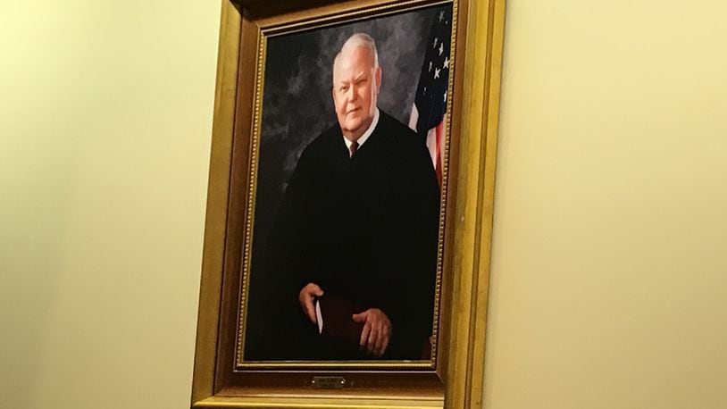 A portrait of late Judge Mark Wall has been added to the Middletown Municipal Courtroom. RICK McCRABB/STAFF