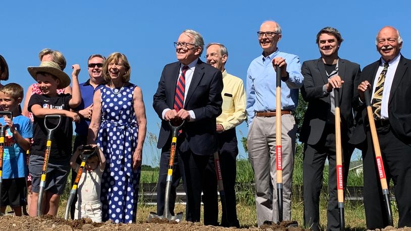 State officials, including Gov. Mike Dewine, and members of DeWine's family broke ground Monday on a new state park dedicated to Ohio's indigenous peoples. LONDON BISHOP/STAFF