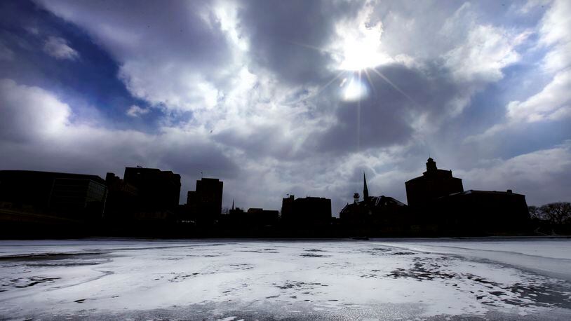 A frozen river and frigid sky frames downtown Dayton Feb. 19, 2015 . LISA POWELL / STAFF