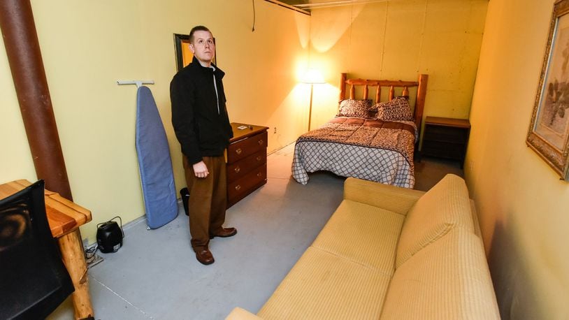 Rob Merrill, youth pastor at Calvary Tabernacle Church, shows off the motel-style rooms in the basement of the church Friday, March 16. Calvary Tabernacle Church in Madison Twp. is developing the City of Refuge Mission to help families displaced as a result of the opioid epidemic. The church is building 14 motel-style living units to become temporary housing for women and children who have been displaced following the sudden death of a family member or if they feel endangered in their current living arrangements. It will also provide long-term housing and care for abandoned children. The facility will have a large commercial kitchen, provide services to help to find long term housing and job search solutions. It will also provide counseling services to assist in the recovery process as well as nurses to provide health checks and physician referrals.The facility is not open yet but the church hopes to partner with other social service agencies and churches. NICK GRAHAM/STAFF