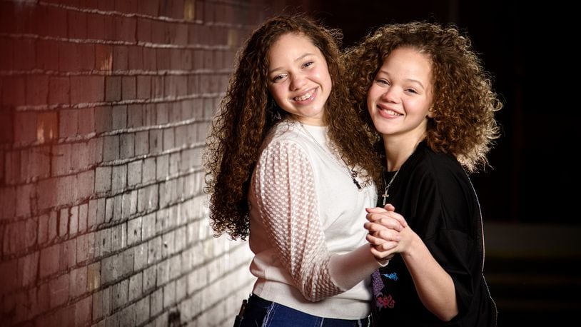 The Cunningham sisters, Macie, 15, left, and Marie, 13, have been singing on social media trying to spread a positive message and recently sent an audition video to the television show The Voice. NICK GRAHAM / STAFF