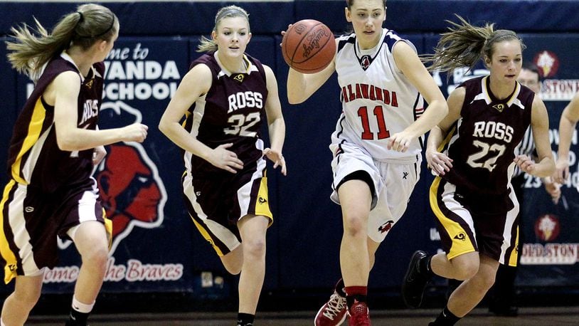 Talawanda’s Ana Richter (11) dribbles the ball on a fast break during a game against visiting Ross on Jan. 14, 2012, in Oxford. JOURNAL-NEWS FILE PHOTO