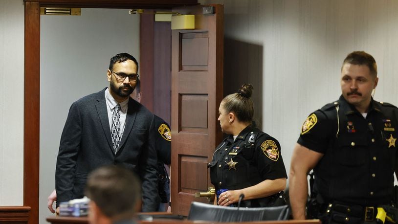 Gurpreet Singh, indicted in the deaths of four family members in 2019 in their West Chester home, walks into court for closing arguments of his retrial Friday, May 10, 2024 in Butler County Common Pleas Court in Hamilton. NICK GRAHAM/STAFF