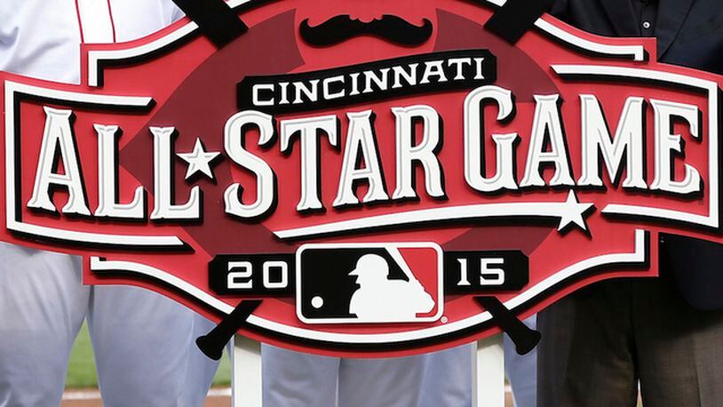 Cincinnati Reds owner Bob Castellini and general manager Walt Jocketty unveil the 2015 All Star Game logo prior to the game against the Cleveland Indians at Great American Ball Park on August 6, 2014 in Cincinnati, Ohio. (Photo by Joe Robbins/Getty Images)