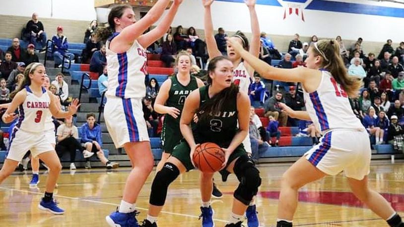 Badin’s Shelby Nusbaum (2) finds herself surrounded by Carroll Patriots, including Julia Keller (42) and Jillian Roberts (13), during Saturday afternoon’s game in Riverside. Carroll won 64-57. CONTRIBUTED PHOTO BY TERRI ADAMS