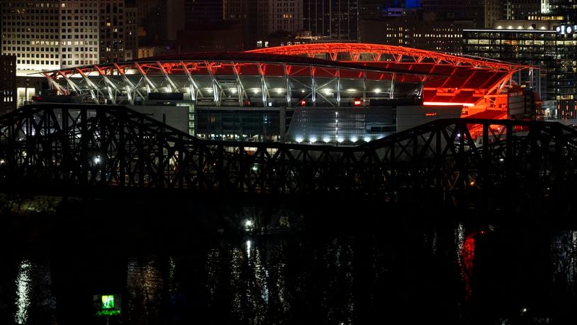 Paul Brown Stadium was glowing orange from the inside in Cincinnati early Tuesday, Feb. 1, 2022 in support of the Cincinnati Bengals making it to the Superbowl. NICK GRAHAM/STAFF