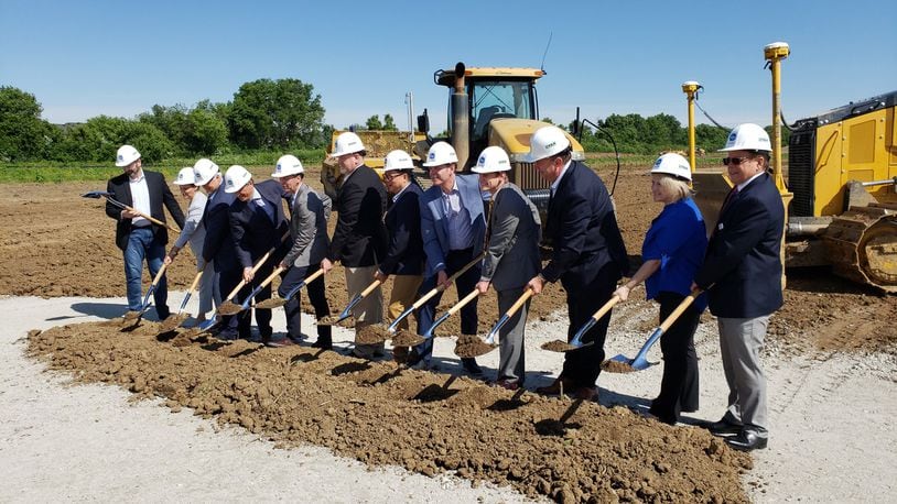 Kroger broke ground on its new 335,000-square-foot high-tech customer fulfillment center at 6266 Hamilton Lebanon Road in Monroe Wednesday, June 12, 2019. The automated warehouse is a collaboration between Kroger and Ocado, one of the world s largest dedicated online grocery retailers. Pictured left to right are left to right are Yael Cosset, Kroger Senior Vice President and Chief Information Officer; Jessica Adelman, Kroger Group Vice President, Corporate Affairs; Scott Hays, Kroger Cincinnati-Dayton Division President; Alex Tosolini, Kroger Senior Vice President, New Business Development; Robert Clark, Kroger Senior Vice President of Supply Chain, Manufacturing, and Sourcing; David Hardiman-Evans, Senior Vice President, North America, Ocado Solutions; Todd Schell, Senior Vice President, Industrial, Ryan Companies; Joshua Tovey, Southwest Ohio Regional Liaison, Lt. Governor; Tim Massa, Kroger Senior Vice President and Chief People Officer; Monroe council members Christina McElfresh and Todd Hickman. ERIC SCHWARTZBERG/STAFF
