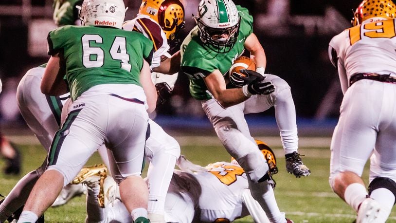 Badin’s Alex DeLong carries the ball during their first round playoff football game against Ross Friday, Nov. 9, 2019 at Hamilton’s Virgil Schwarm Stadium. Badin won 46-14 to advance to the next round. NICK GRAHAM/STAFF