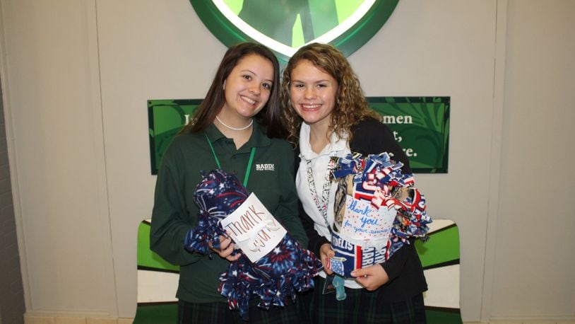 Badin High School sophomores Stephanie Hartkemeyer and Elizabeth Kreimer recently embarked on a fundraising effort that would help them have enough money to make blankets for military veterans. To make money, the two girls sold Halloween Boo-grams, or quick notes of “hello” from one Badin student to another with a sucker attached for $1 each. CONTRIBUTED