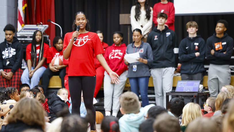 Fairfield High School sophomore basketball player Lexi Hayes speaks to students as coaches, students and faculty talk at Fairfield North Elementary about the importance of grit during an assembly Thursday, Dec. 1, 2022. NICK GRAHAM/STAFF