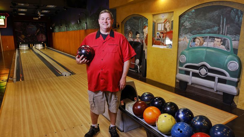 Butler County Common Pleas Court Judge Dan Haughey is an avid bowler in his off time and spends time with family and friends in his home bowling alley. NICK GRAHAM/STAFF