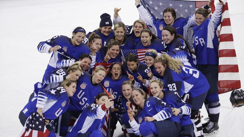 The United States team celebrates winning the women’s gold medal hockey game against Canada at the 2018 Winter Olympics in South Korea, Thursday, Feb. 22, 2018. (AP Photo/Matt Slocum)