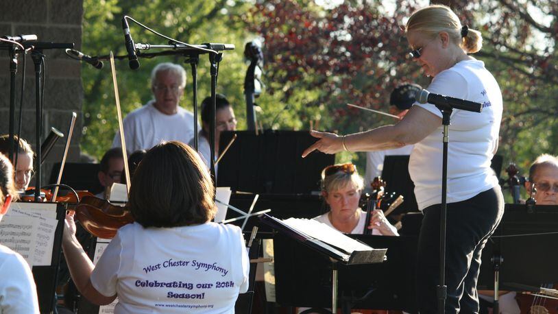 Members of the West Chester Symphony Orchestra perform at a concert in the park. CONTRIBUTED
