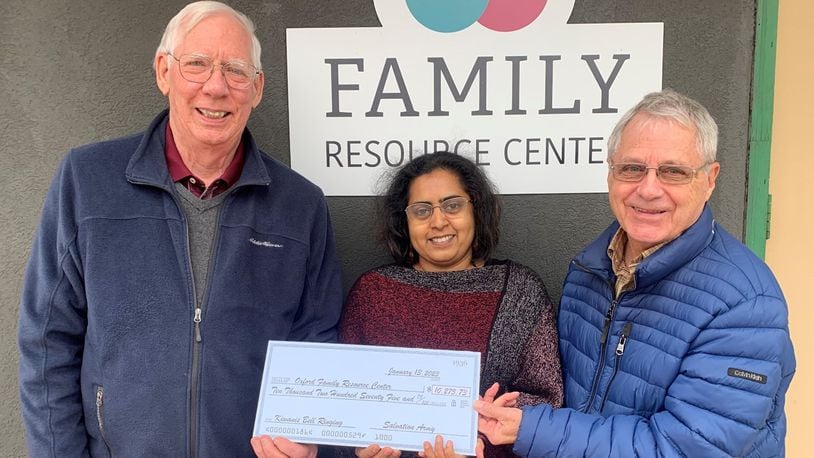 Kiwanis Vice President John Skillings and Kiwanis Community Services Chair Dave Belka present an initial check for $11,422 to Nicola Rodrigues, Interim Director and Client Services for the Family Resource Center. CONTRIBUTED