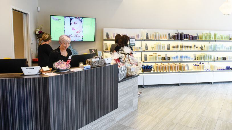 The new Pure Concept Salon + Spa on Gibson Street at Liberty Center in Liberty Township opened in March. NICK GRAHAM/STAFF