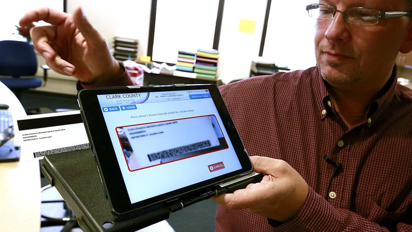 Butler County is moving to electronic poll books, similar to the one pictured here. STAFF FILE PHOTO